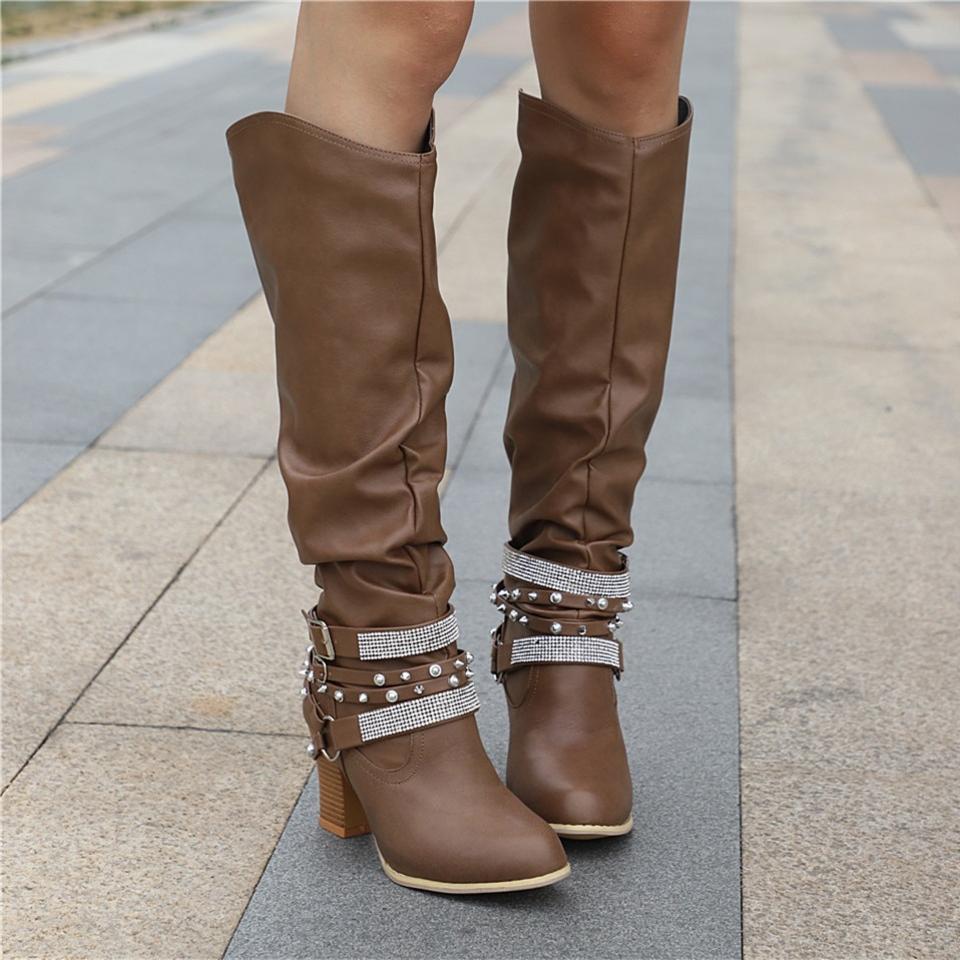 Lumina Wear Isabella women's knee-high boots with studded straps, slouch design, and block heel for stylish footwear.