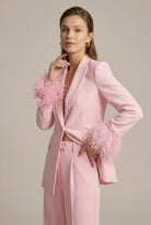 Lumina Wear Isabella tailored blazer with feather cuffs paired with straight-leg trousers, stylish suits and blazers for women.