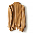 Elegant genuine leather blazer jacket by Lumina Wear featuring a tailored fit and a single button closure, styled on a model.
