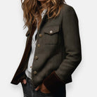 Women's tailored herringbone tweed blazer with velvet cuffs by Lumina Wear, featuring a classic fit and stylish detailing.