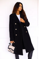 Women's Isabella winter trench coat by Lumina Wear with tailored fit, longline design, structured shoulders, and classic winter style.