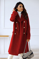 Lumina Wear Isabella women's longline winter trench coat with structured shoulders, tailored fit, in neutral fabric.
