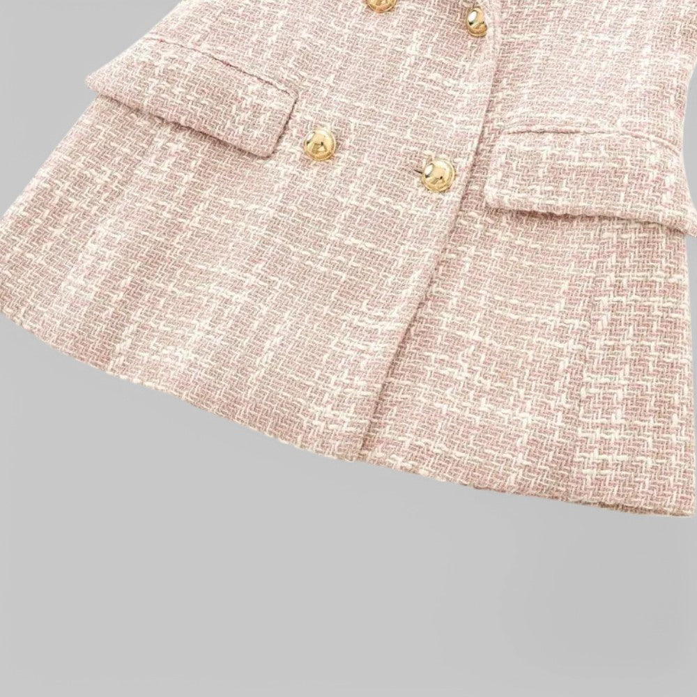 Pink tweed blazer by Lumina Wear featuring a tailored fit and double-breasted design, styled on a mannequin.