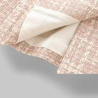 Pink tailored tweed blazer with double-breasted design for women, by Lumina Wear, shown on a model.