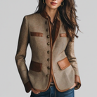 Women's tailored tweed blazer with faux-leather trim by Lumina Wear, featuring a structured fit and classic style.