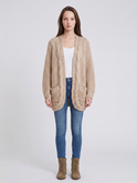 Textured oversized Lumina Wear cardigan with batwing sleeves, featuring a relaxed fit and cozy knit fabric.