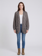 Light gray textured oversized women's cardigan with batwing sleeves from Lumina Wear, styled casually on a model.