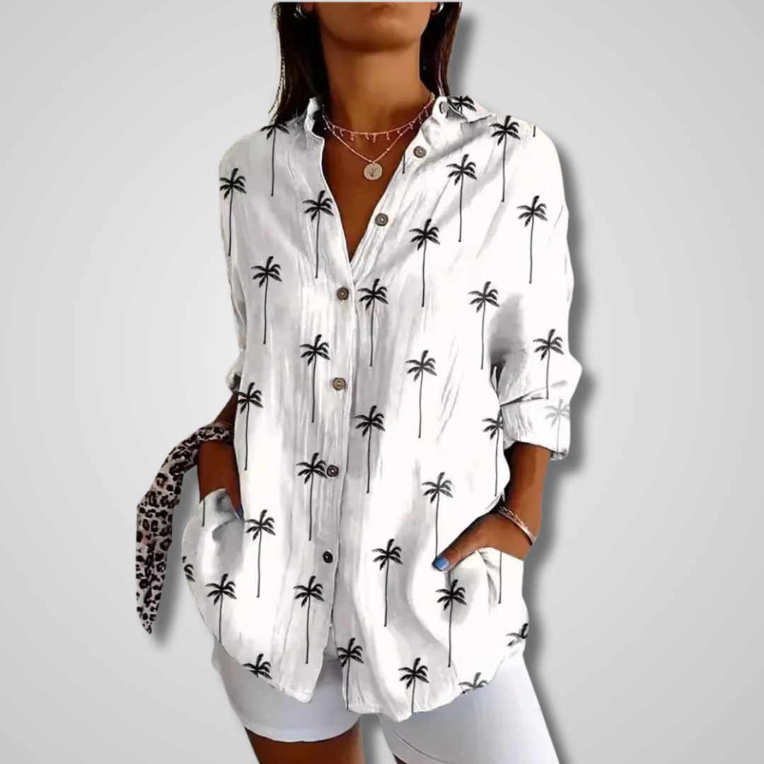 Light blue vintage-inspired Lumina Wear Isabella women's relaxed shirt with a soft, flowing fabric and effortless charm.