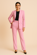 Jasmine tailored blazer and elegant pleated pants set by Lumina Wear, featuring a stylish, fitted blazer and matching pleated trousers.