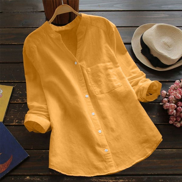 Light blue Jessica relaxed fit button blouse by Lumina Wear, featuring a timeless design and classic collar.