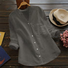 Pink Lumina Wear Jessica relaxed fit button blouse with timeless design, shown on a hanger against a neutral background.