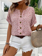Light floral blouse from Lumina Wear featuring a relaxed fit and button front, displayed on a mannequin.