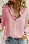 Light blue Julia relaxed button blouse by Lumina Wear featuring a classic fit and elegant design, displayed on a mannequin.