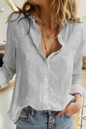 Light beige Julia relaxed button blouse by Lumina Wear with a classic collar and elegant fit, displayed on a plain background.