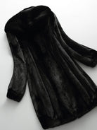 Lumina Wear Kensington elegant long faux fur winter coat with hood, featuring plush fur trim and cozy design.