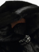Lumina Wear Kensington elegant long faux fur winter coat with hood, featuring plush fur and stylish design for cold weather.