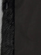 Luxurious Kensington Lumina long faux fur winter coat with hood, stylish and warm for cold weather.