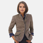 Black blazer jacket by Lumina Wear featuring a modern design and single-button closure, displayed on a mannequin.