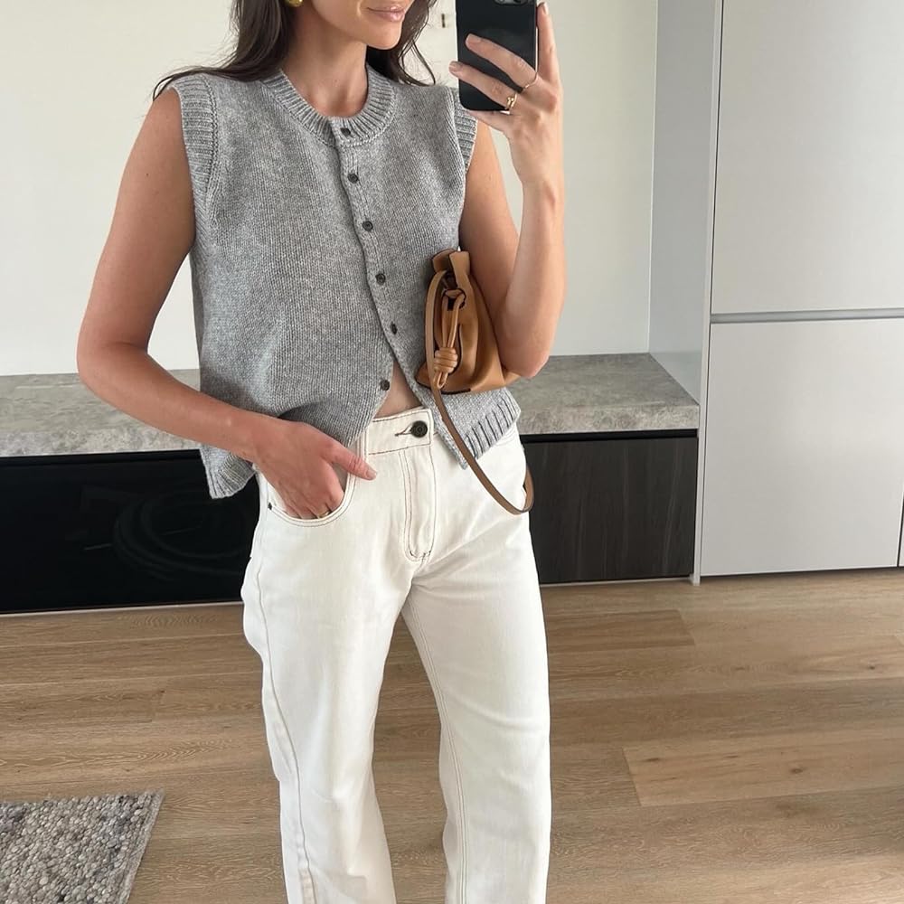 Kylie Lumina relaxed knitted vest with button-front closure and rolled-edge detail, featuring soft, textured fabric and classic style.