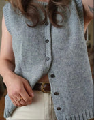 Kylie Lumina Wear relaxed button-front knitted vest with rolled-edge detail, featuring soft knit fabric and casual style.