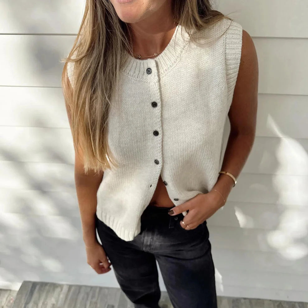 Kylie Lumina knit vest with relaxed fit, button-front design, and rolled-edge detail, featuring a cozy, casual style.