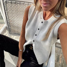 Kylie Lumina relaxed button-front knitted vest with rolled-edge detail, casual sleeveless knitwear for layered styling.