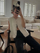 Kylie Lumina Wear relaxed knitted vest with button front and rolled-edge detail, casual sleeveless knitwear for layered style.