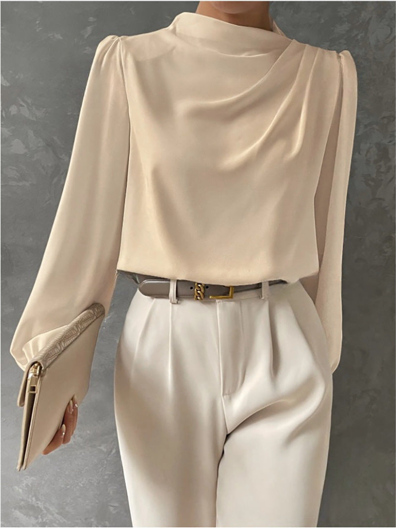 Lumina Wear Madison elegant relaxed fit blouse in soft fabric, showcasing a timeless style with subtle detailing.