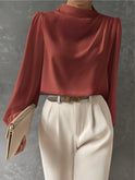 Lumina Wear Madison relaxed fit blouse featuring elegant design and timeless appeal, shown in a stylish, natural pose.