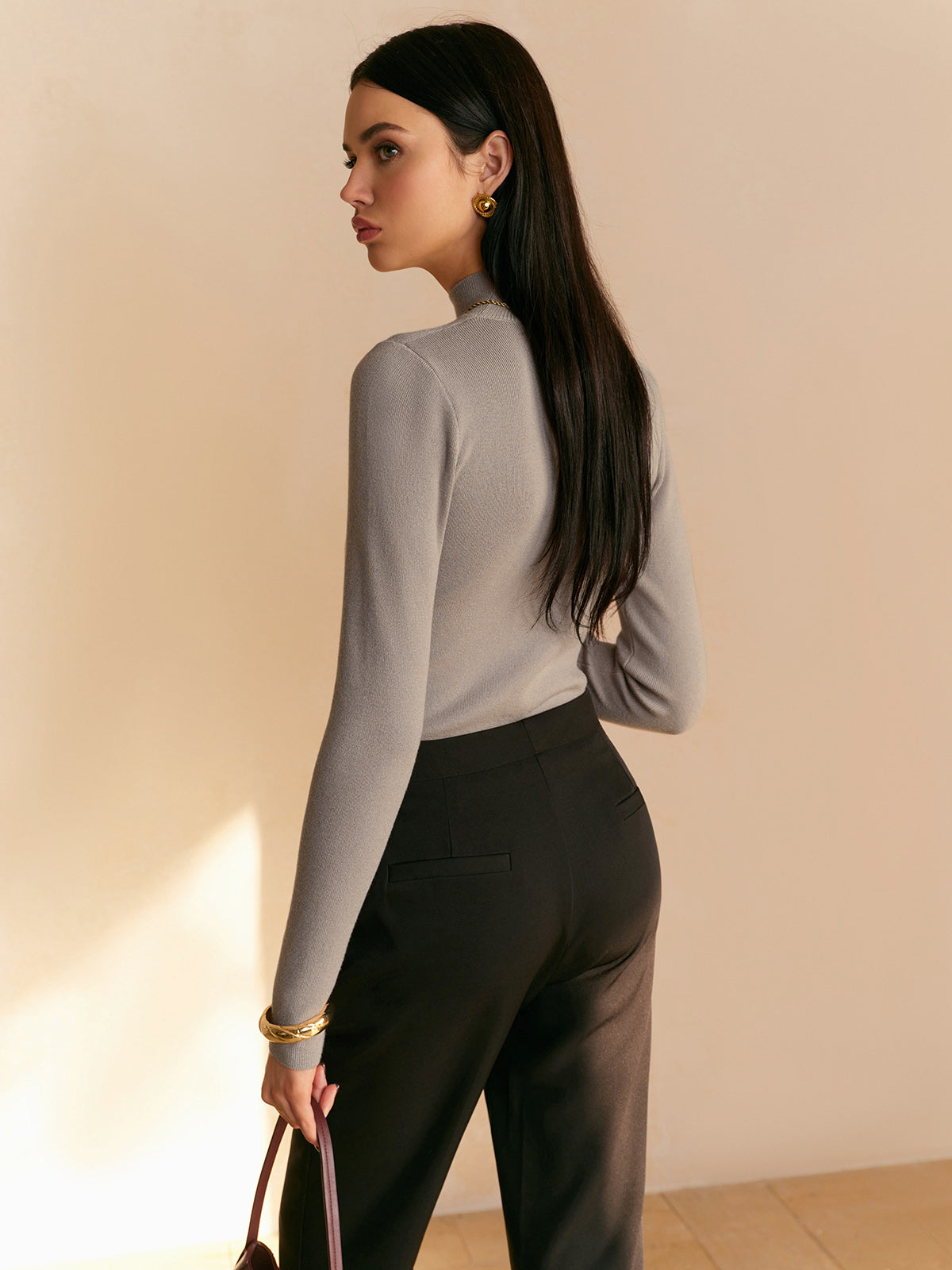 Lumina Wear women's top with elegant mock neck design and relaxed fit, showcasing soft fabric and stylish silhouette.