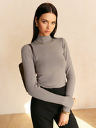 Lumina Women's Maisie top featuring an elegant mock neck and relaxed fit, shown in a stylish, comfortable design.