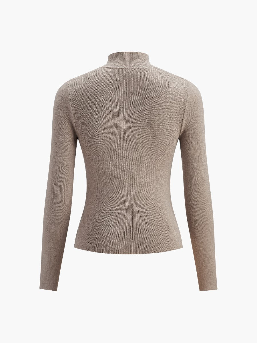Women's Lumina Wear Maisie top with elegant mock neck, relaxed fit, soft fabric, and stylish design in a neutral color.