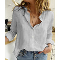 Makayla Lumina Wear airy blouse with relaxed fit, lightweight fabric, and casual style, shown on a model with rolled-up sleeves.