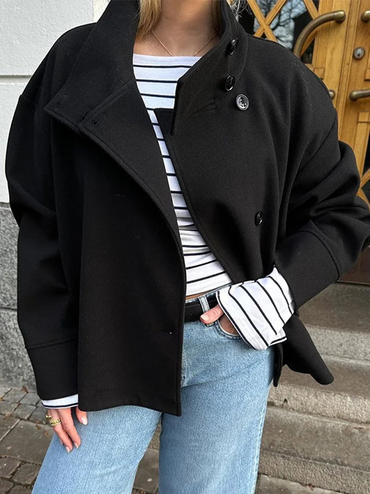 Lumina Wear Martha structured high-neck cropped jacket with button closure, stylish and tailored for a modern look.