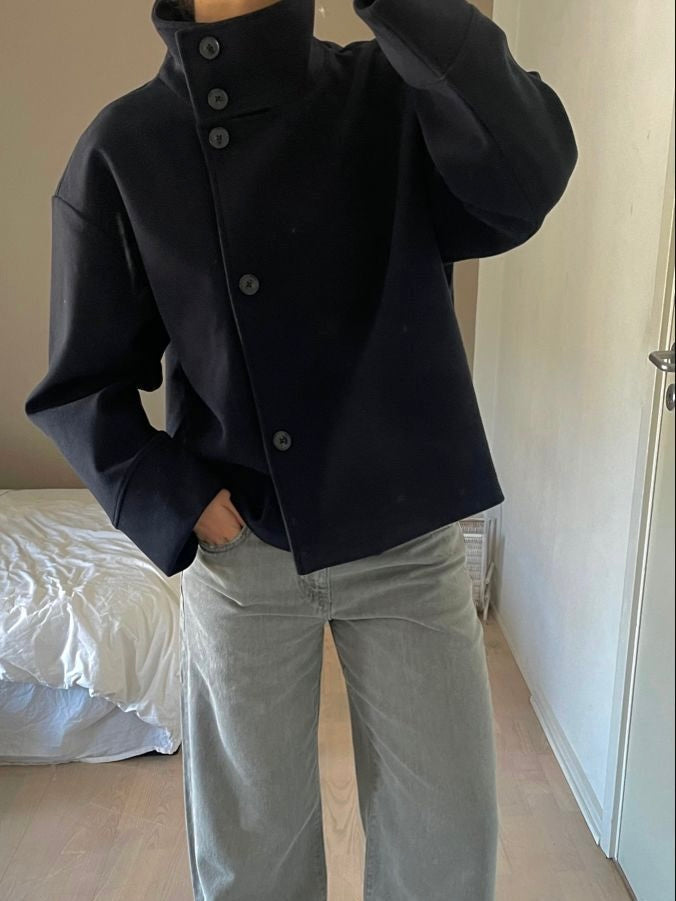 Lumina Wear Martha structured high-neck cropped jacket with button closure, stylish and modern jacket design.