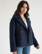Cropped double-breasted trench coat with structured shoulders from Lumina Wear, in a stylish and modern design.