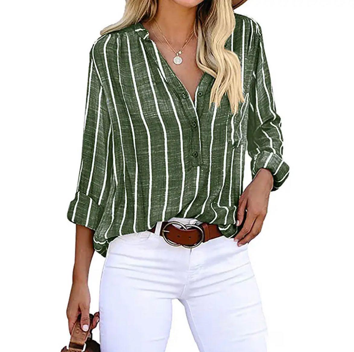 Light blue and white striped Lumina Wear Mia summer blouse with relaxed fit and airy fabric, perfect for warm weather.