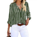 Light blue and white striped Lumina Wear Mia relaxed summer blouse with airy fit, short sleeves, and casual style.