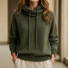 Lumina Wear Milan oversized hoodie made from breathable merino wool with adjustable neck and relaxed fit.