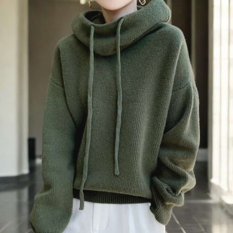 Lumina Wear Milan oversized hoodie made of breathable merino wool with an adjustable neck and relaxed fit.