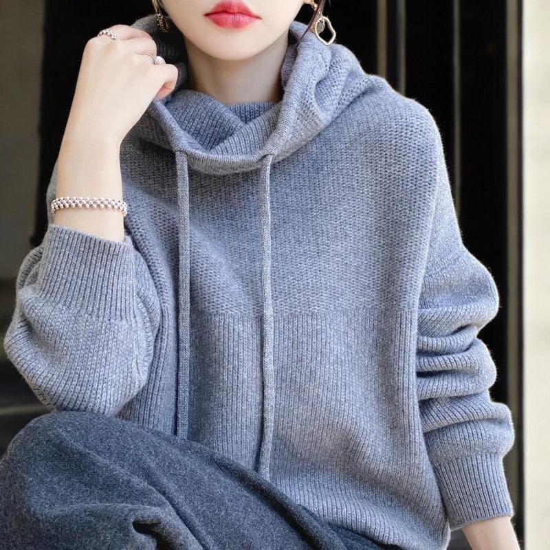 Lumina Wear Milan oversized breathable merino wool hoodie with adjustable neck, relaxed fit, and cozy texture.