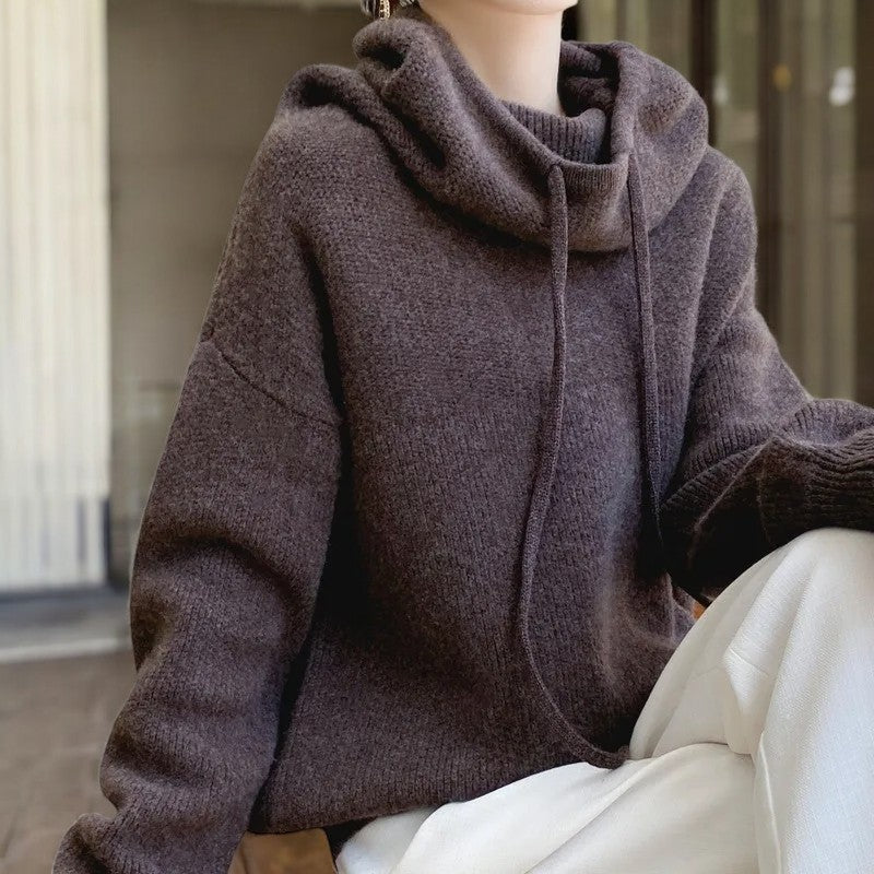 Lumina Wear Milan relaxed oversized hoodie made of breathable merino wool with adjustable neck detail.
