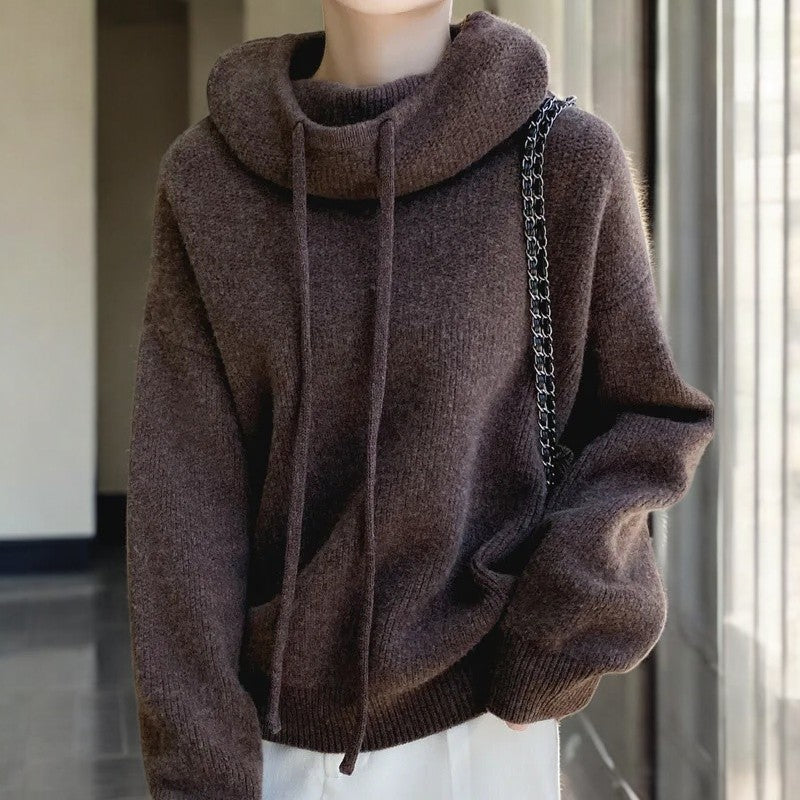 Relaxed oversized Lumina Wear Milan merino wool hoodie with breathable fabric and adjustable neck, shown on a model.