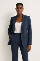 Natalie white tailored pantsuit with straight-leg design from Lumina Wear, featuring a sleek, professional fit and crisp fabric.