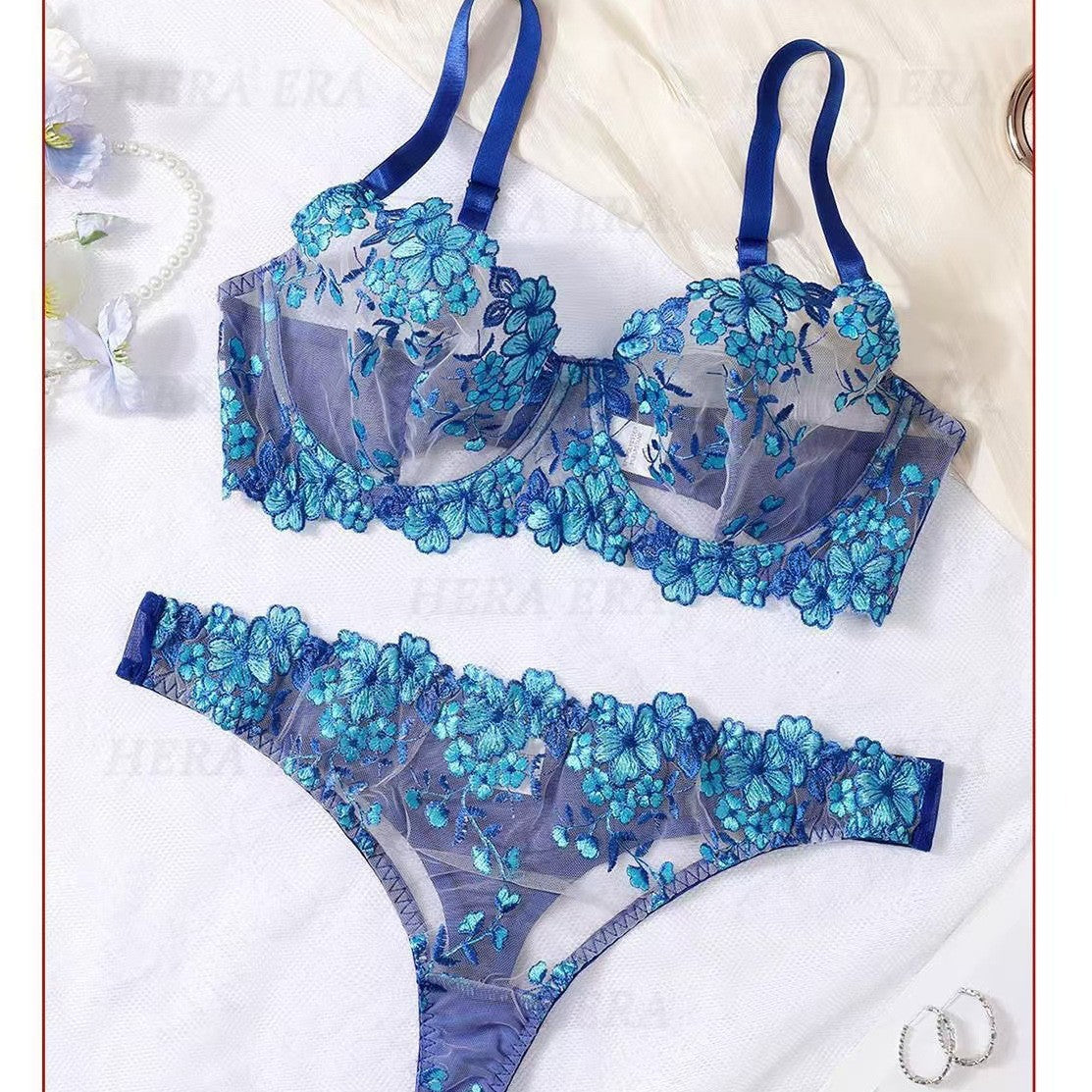 Blue floral embroidery lingerie set by Lumina Wear, featuring delicate embroidered details and matching bra and panty.