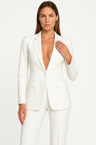 Lumina Wear Olivia tailored trouser suit set with plunging neckline, stylish women's suit featuring a fitted blazer and matching trousers.