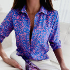 Brightly patterned Lumina Wear Peyton relaxed fit blouse for women with bold print and comfortable, loose-fitting design.