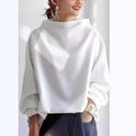 Rachel Lumina Wear elegant high-neck top with long sleeves, featuring a fitted design and stylish neckline.