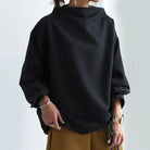 Rachel Lumina high-neck women's top with long sleeves, stylish and elegant, in a soft fabric for a chic everyday look.