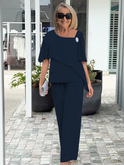 Lumina Wear Serena elegant lightweight two-piece dress set with flattering silhouette, shown with flowing fabric and stylish design.